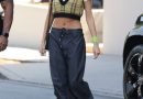 Hailey Bieber Put a Gen Z Spin on ‘Clueless’ Attire in a Yellow Plaid Cropped Vest and Low-Rise Cargo Pants