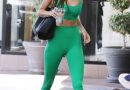 Kendall Jenner Paired an Ab-Baring Green Sports Bra and Leggings With Socks and Slides