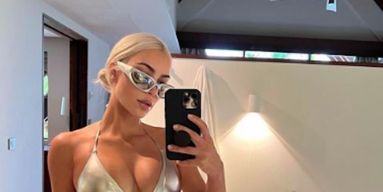 Kim Kardashian Posts Sexy Silver Bikini Pic With a Promise In the Caption
